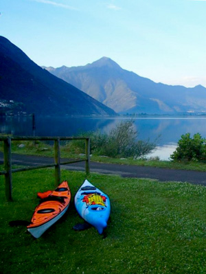 Photo of two Kayaks on the shore of Lake Como